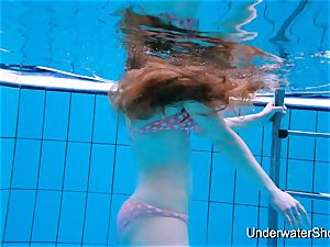 cool nymph demonstrates fantastic figure underwater